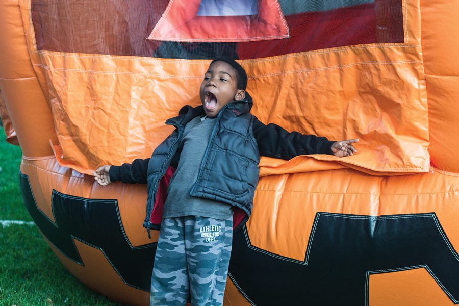 “The pumpkin is eating me!” said Destin, arms outstretched on a giant inflatable pumpkin. Fall Fest, put on at Gibbs-Morrison Cultural Center by Parks, Recreation and Community Services, featured a pumpkin moonwalk, costumes and face painting. 