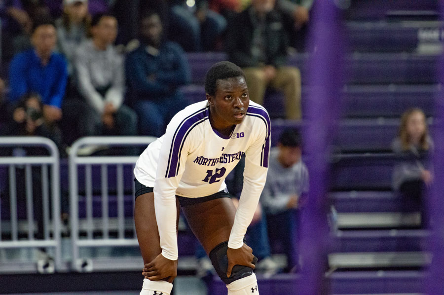 Temi+Thomas-Ailara+stares+at+her+opponent.+The+freshman+outside+hitter+leads+the+Big+Ten+in+kills+per+set.