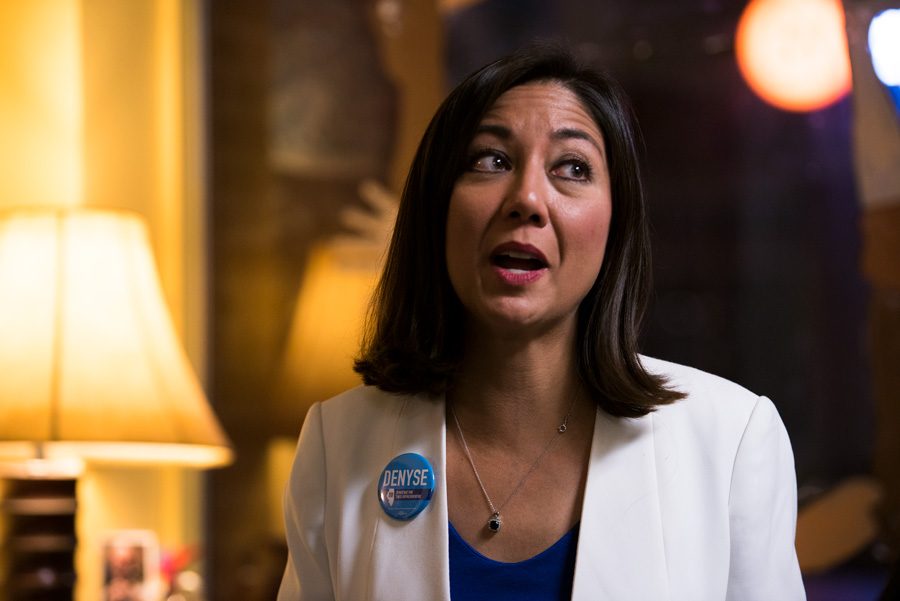 Denyse Wang Stoneback speaks to attendees of Wednesday’s fundraising event at Curt’s Cafe. Stoneback is running for State Representative in the 16th district, focusing on gun control and reproductive rights.