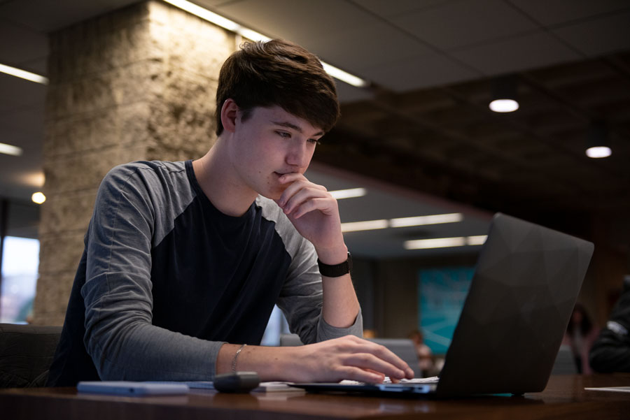 Weinberg sophomore Hugo Compton studies at Norris University Center. Compton has Type 1 Diabetes, which he said can significantly affect his academic performance.