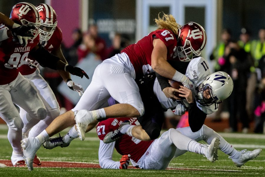 Aidan Smith is tackled by an Indiana defender. The junior quarterback rushed for a team-high 34 yards. 
