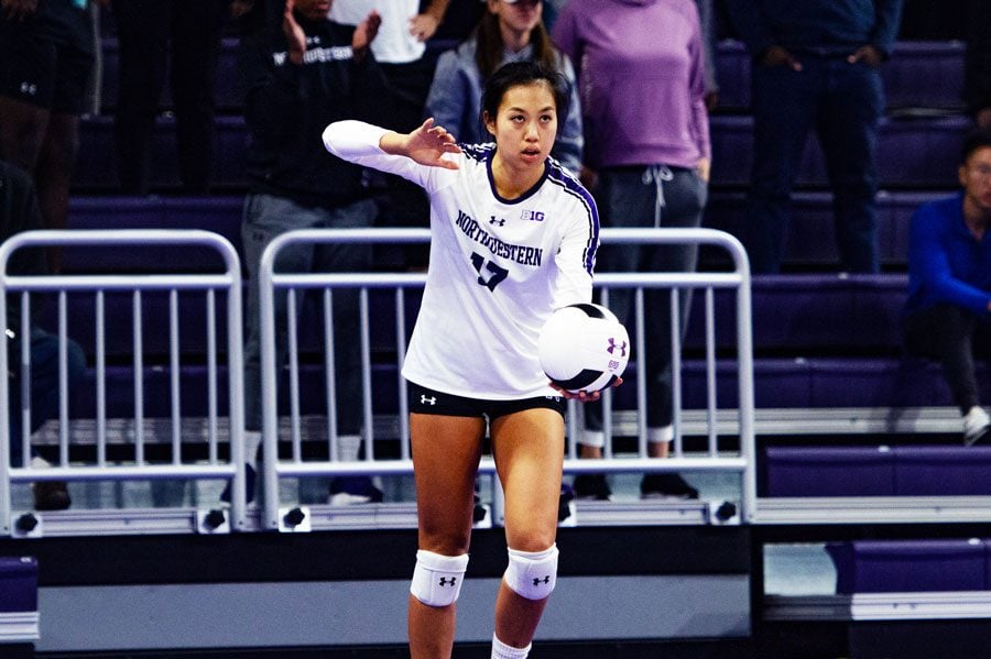 Peyton Chang prepares to hit the ball. The graduate server had 47 assists in the Cats last game against Michigan. 