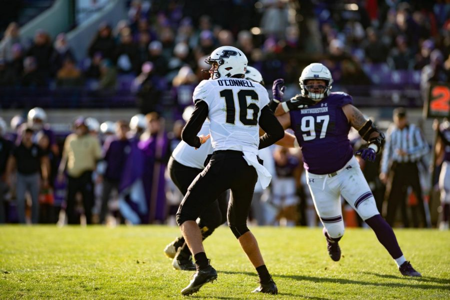 Aidan O’Connell drops back to pass. The sophomore led Purdue to a 24-22 win over Northwestern on Saturday at Ryan Field.