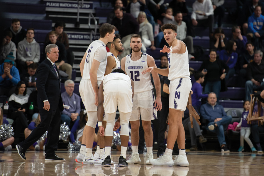 Pete Nance talks to his teammates. The sophomore forward was the lone player to score in double figures for NU on Sunday. 