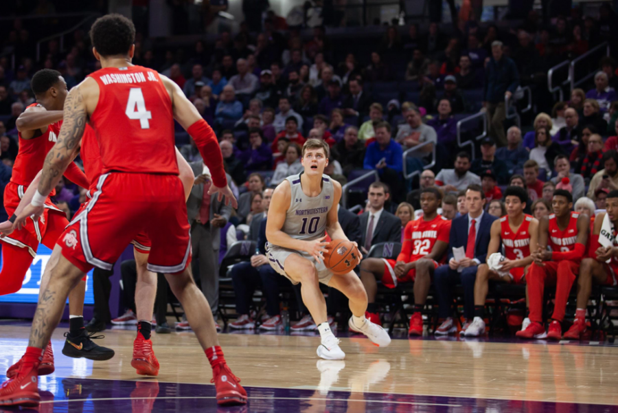 Miller Kopp sets up for a shot. The junior finished with a team-high 20 points in NU’s loss to Ohio State. 