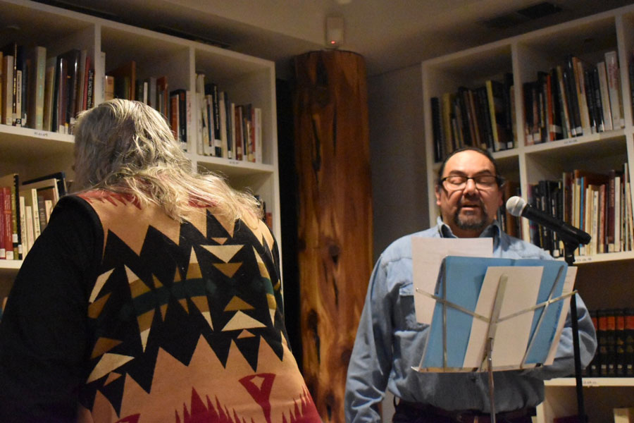 Vincent Romero reads poetry in “A Winter Night of Indigenous Tellings” at the Mitchell Museum of the American Indian. The storytelling event followed a series of Indigenous poetry workshops affiliated with the American Indian Center of Chicago.