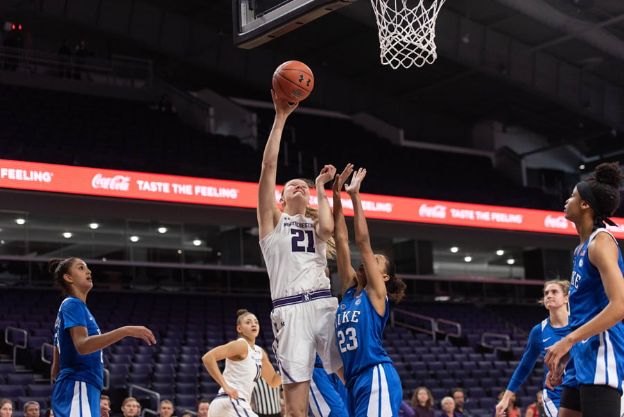 Abbie Wolf goes up for a shot. The senior center scored a career-high 24 points to lead the Cats over Purdue on Sunday.