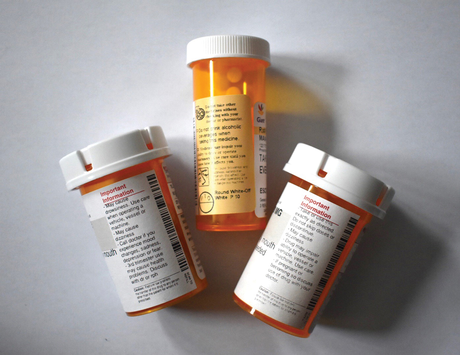 Prescription pill bottles. A recent study reports antidepressant use among youth rises in the wake of fatal school shootings.