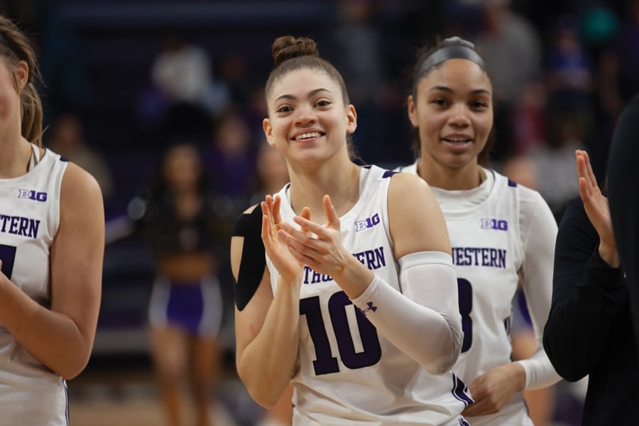 Lindsey Pulliam applauds her team’s effort against Penn State on Jan. 19. The junior is a key member of the No. 21 Wildcats women’s basketball team.