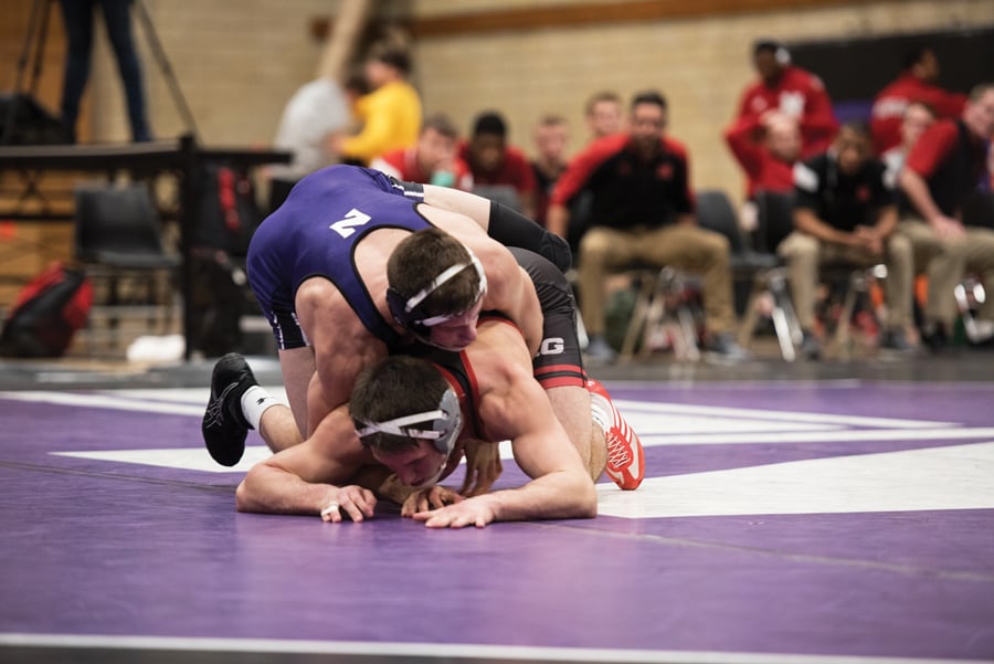 Ryan Deakin wrestles an opponent. The junior improved to 13-0 in his bouts this season with a win on Sunday. 
