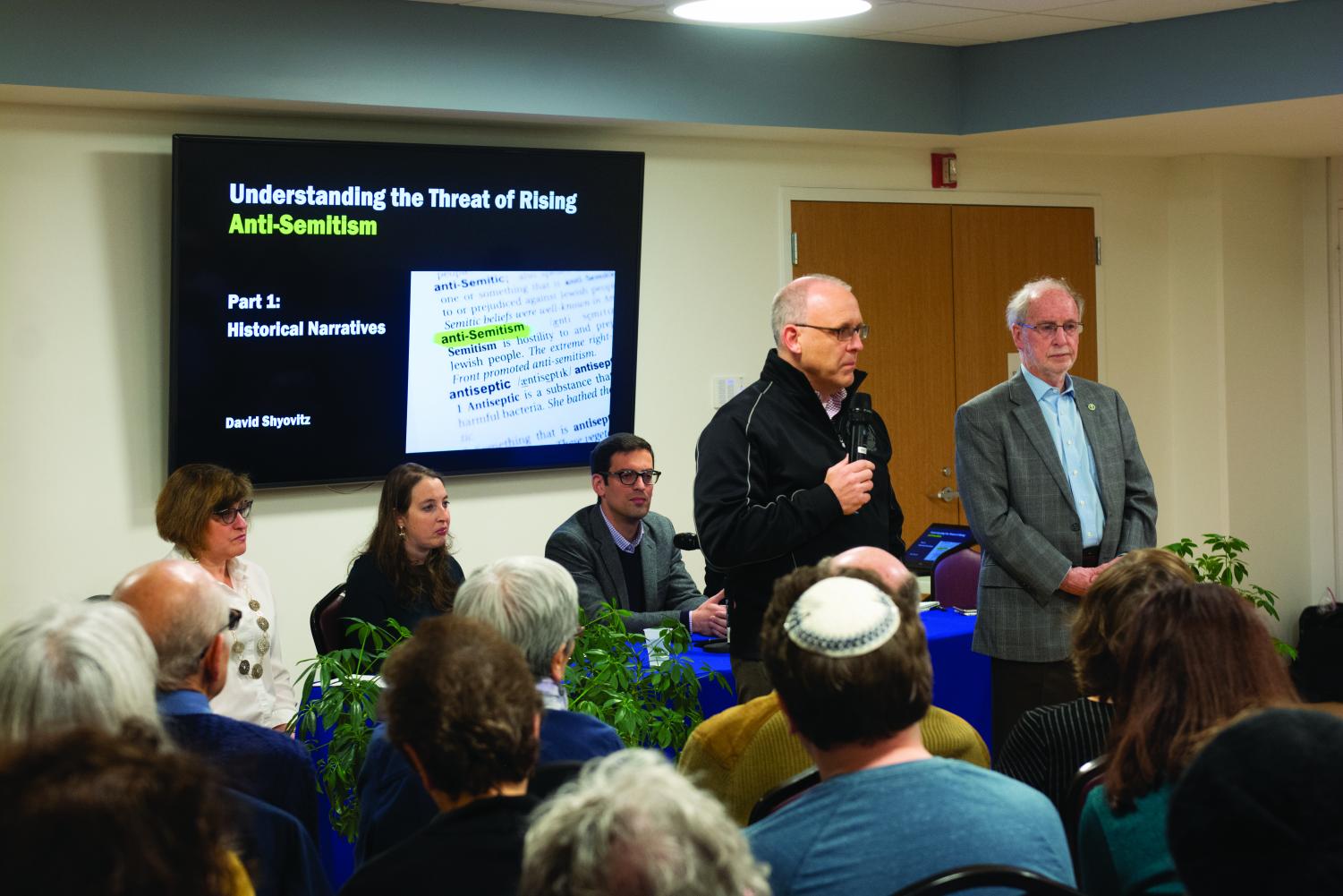 Evanston+Mayor+Steve+Hagerty+speaks+to+community+members+about+the+rise+of+antisemitism+on+Tuesday.+The+event%2C+hosted+at+Beth+Emet+synagogue%2C+featured+a+panel.