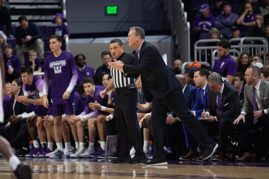 (Daily file photo by Joshua Hoffman). Chris Collins coaches from the sideline. He led Northwestern to an upset win Saturday.