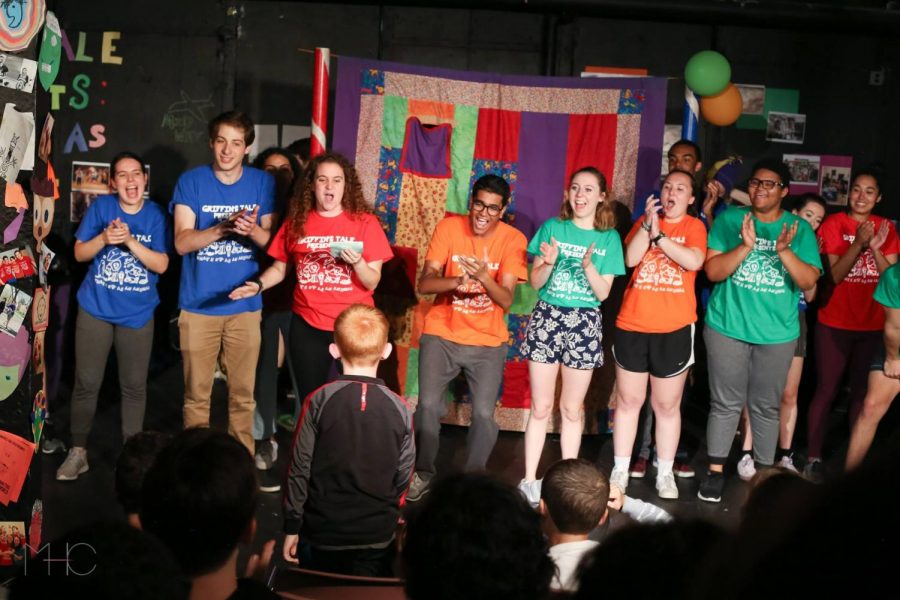 Griffin%E2%80%99s+Tale+members+applaud+a+student+who+wrote+the+story+they+are+about+to+perform.+The+theatre+company+encourages+students+to+write+creatively+and+to+dig+into+their+imagination.+