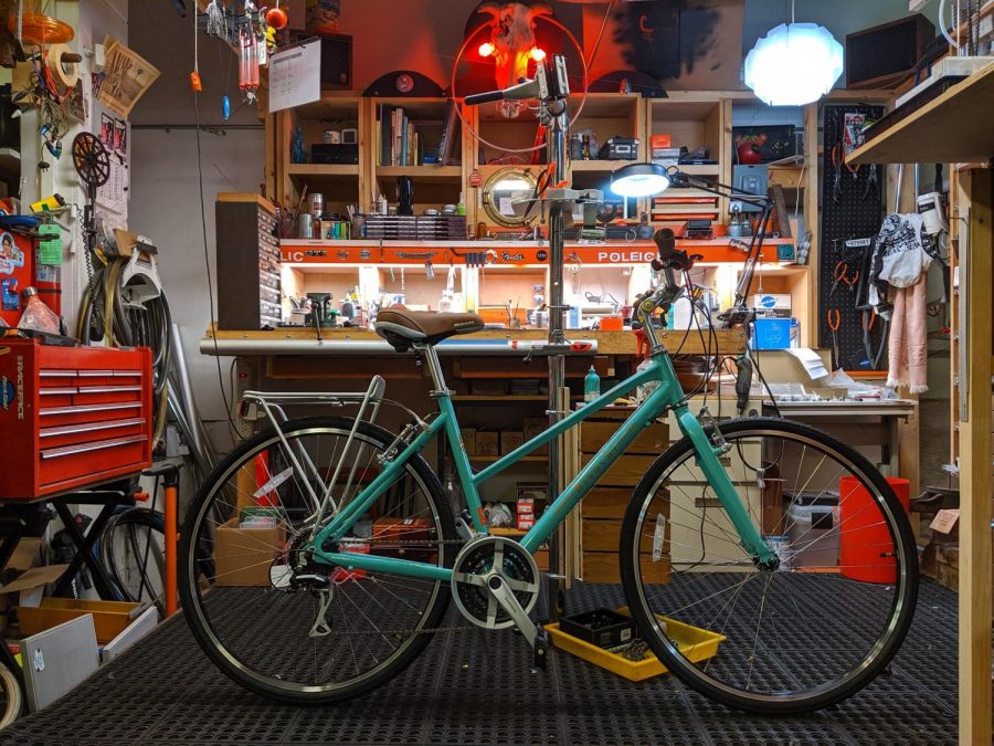 A Bianchi Turismo model sits in Bucephalus Bikes. Run by Alejandro Añón and his wife, Cecelia Wallin, the Lake St. Shop emphasizes car-free living.
