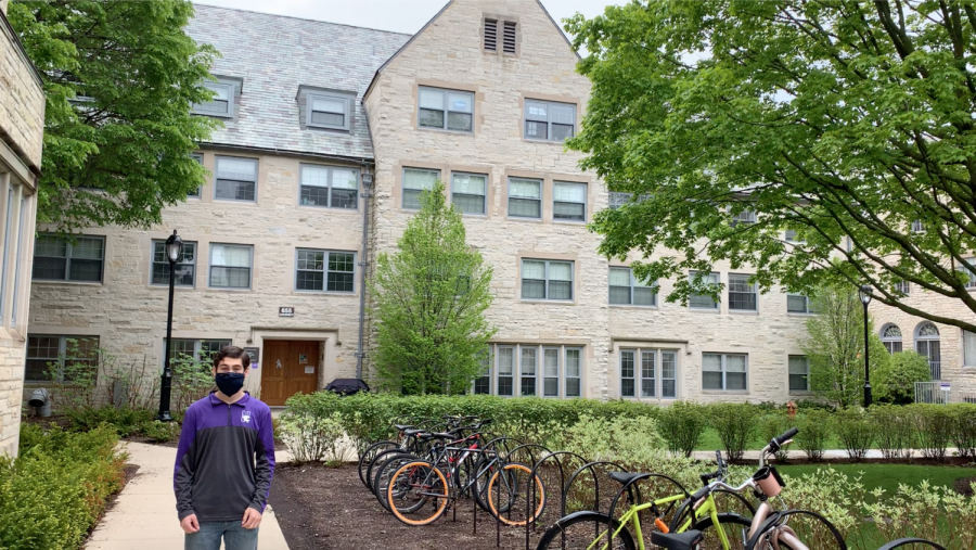 Weinberg first-year Josh Ezrol stands in front of his dorm after returning to campus to pick up the remainder of his belongings on May 18.