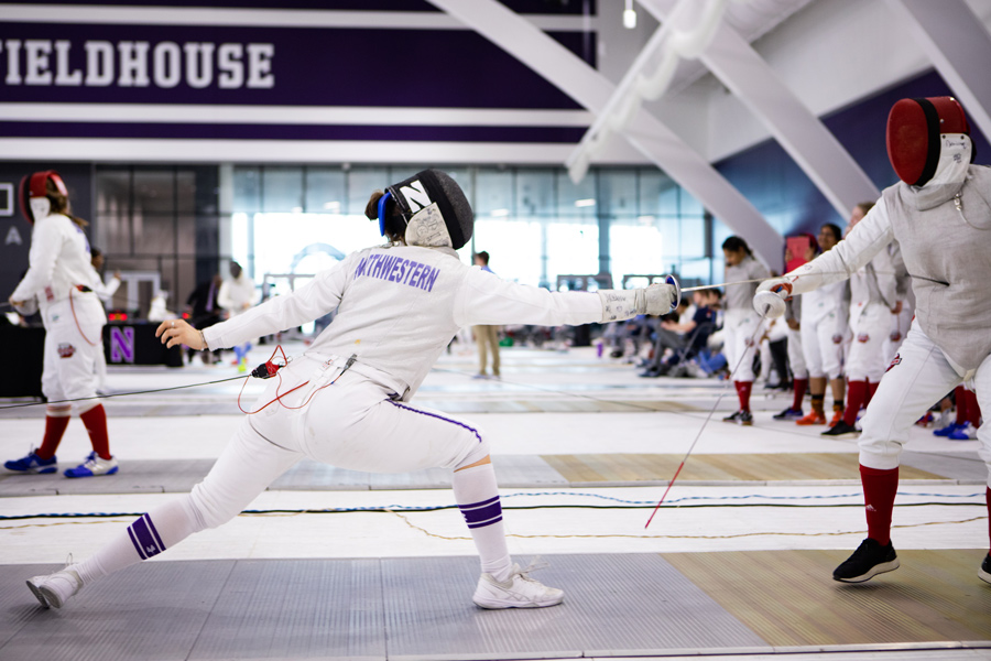 A Northwestern fencer lunges. The team was unable to make it to the finals of the Midwest Championships despite having one of their best seasons in recent years.