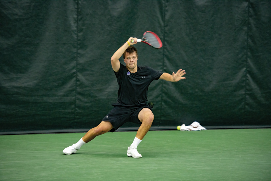 Dominik Stary hits a shot. He collected singles wins against highly-ranked NC State and Harvard teams this season.
