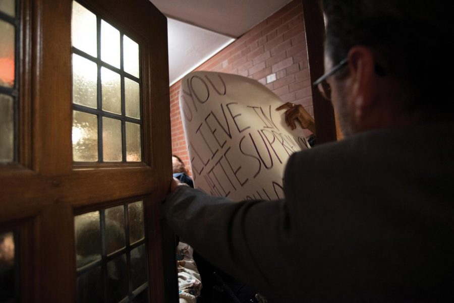  Students attempt to enter Lutkin Hall, where former U.S. Attorney General Jeff Sessions was giving a speech on Nov. 6.