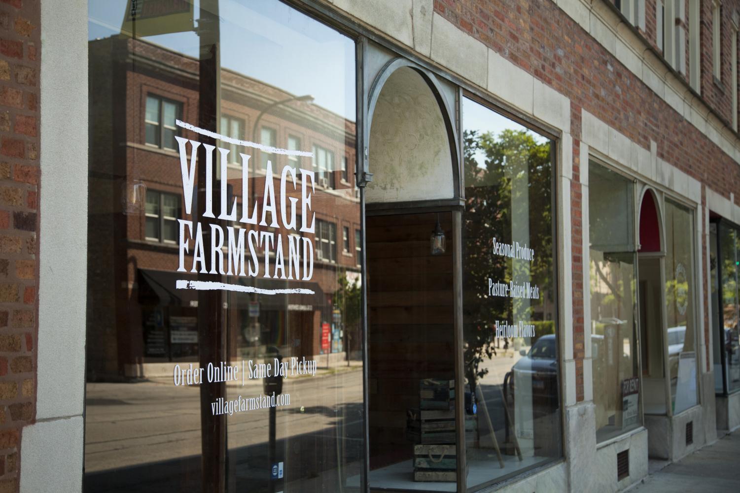 Matt+Wechsler+founded+Village+Farmstand.+The+storefront+opened+its+doors+on+Dempster+Street+in+August.