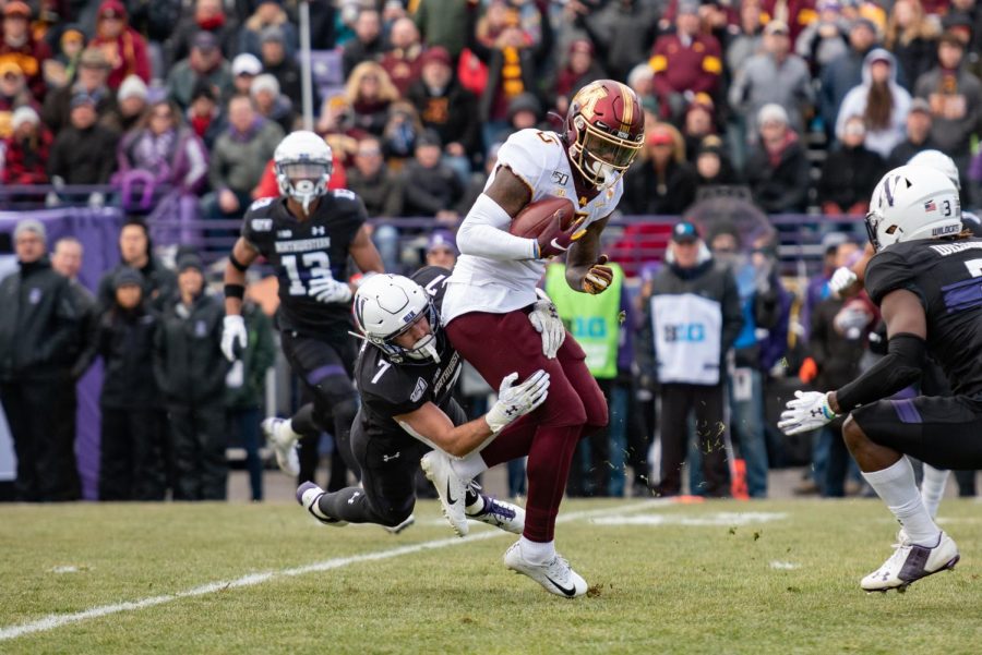 Travis Whillock makes a tackle against Minnesota. The senior safety was one of four Northwestern players to opt out of the 2020 season. 