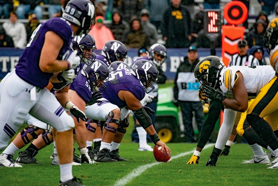 Northwestern’s offensive line prepares to block the opposing defensive lineman. With Rashawn Slater opting out of the season, the Cats will turn to freshman Peter Skoronski to replace him. 