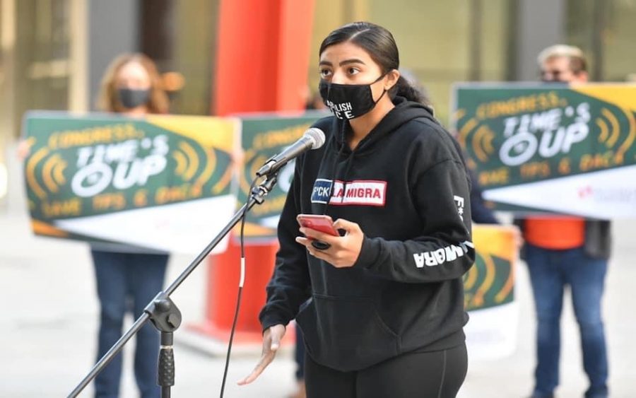 A young non-voter speaks at a protest for the rights of Deferred Action for Childhood Arrivals (DACA) recipients. The future of DACA hangs in the balance in this election, DACA recipient and Alianza Americas staff member Dulce Dominguez said.