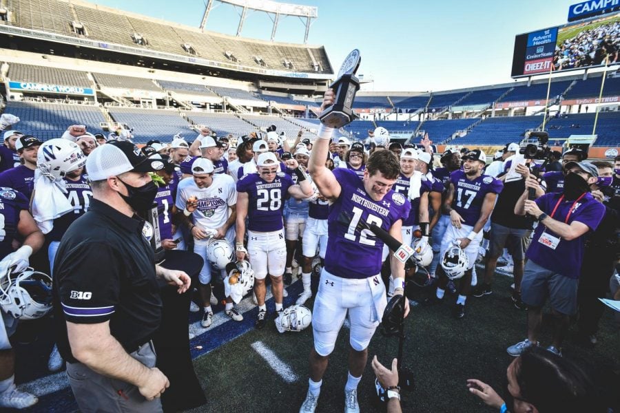 Peyton Ramsey lifts the Citrus Bowl MVP trophy. The quarterback finished Friday's game with three passing touchdowns and one rushing touchdown.