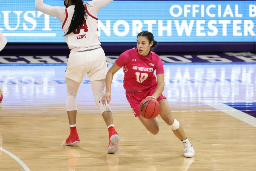 Veronica Burton dribbles the ball Feb. 20 against Wisconsin. Today against Illinois, her four free throw points in the first quarter helped Northwestern stay in a game that looked like it was slipping away.