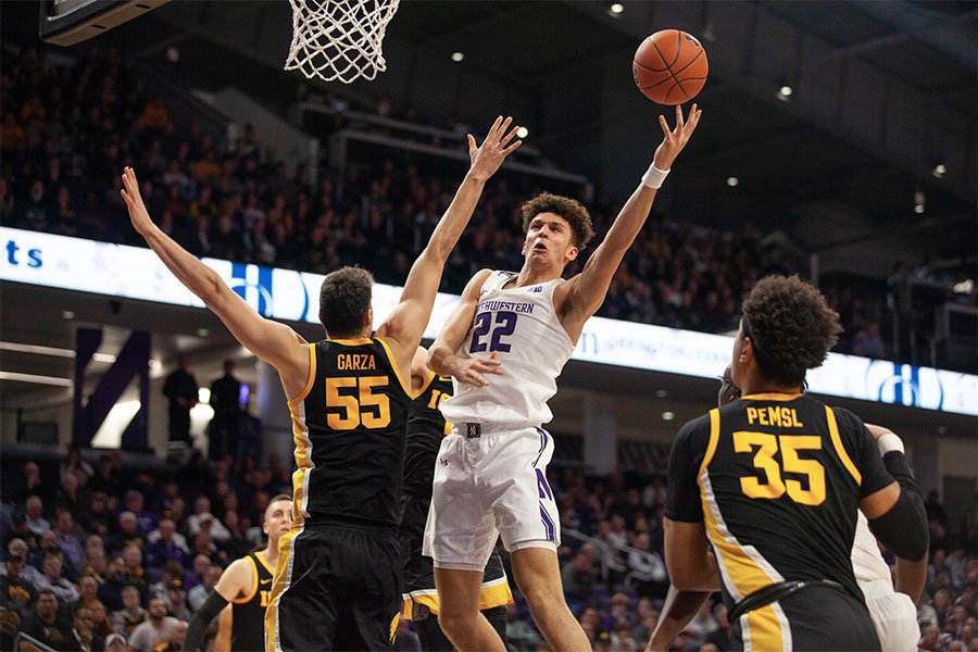 Pete Nance goes in for a layup. The junior forward had 12 points in the second half to key Northwestern’s ultimately unsuccessful comeback attempt.
