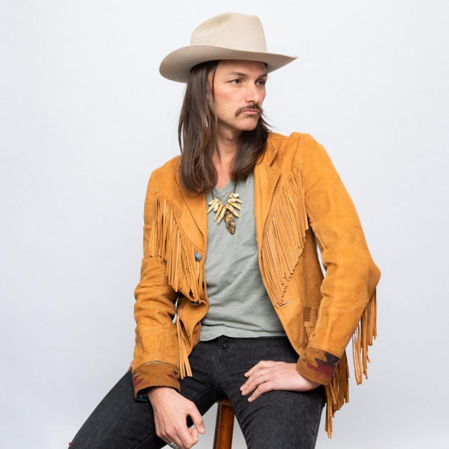  Duane Betts, the guitarist for Allman-Betts band, seated. Duane is the son of Dickey Betts, famed guitarist for famous blues rock band the Allman Brothers.