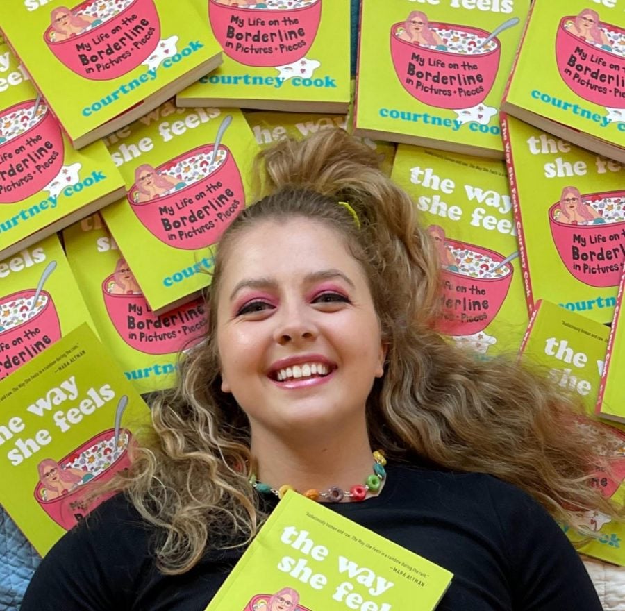 Courtney, with blonde hair and pink eyeshadow and a necklace made of cereal, lies on many copies of her book, which has a bright green cover and an illustration of her floating in a pink bowl of cereal on it.
