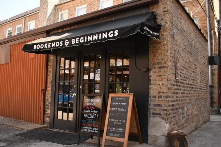 A storefront with an awning that says Bookends and Beginnings