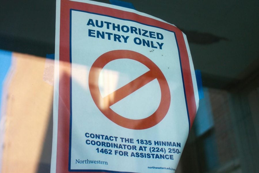 A sign on a door that says “Authorized Entry Only.”