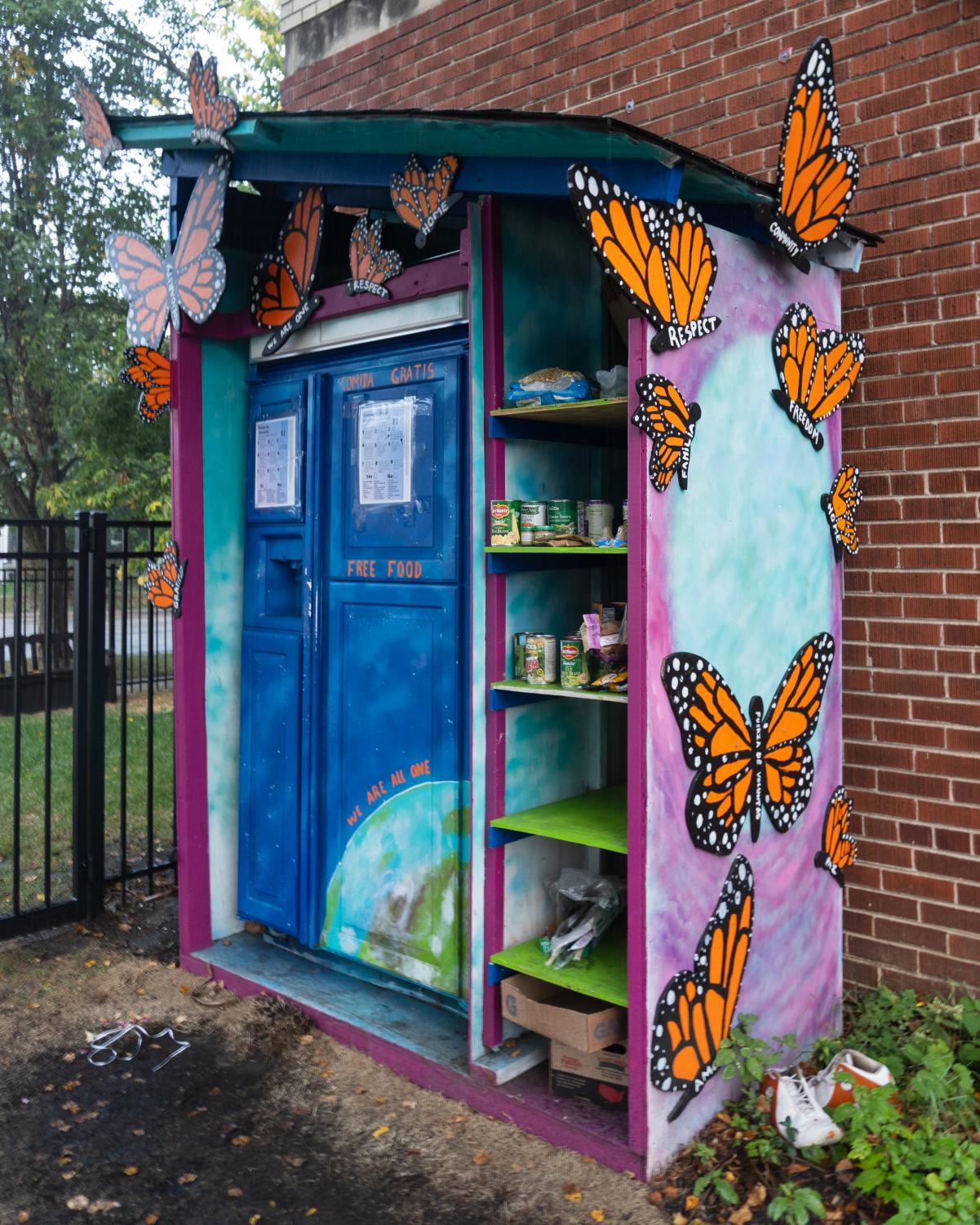 The+community+fridge+outside+Childcare+Network+of+Evanston+is+decorated+with+butterfly+decals.