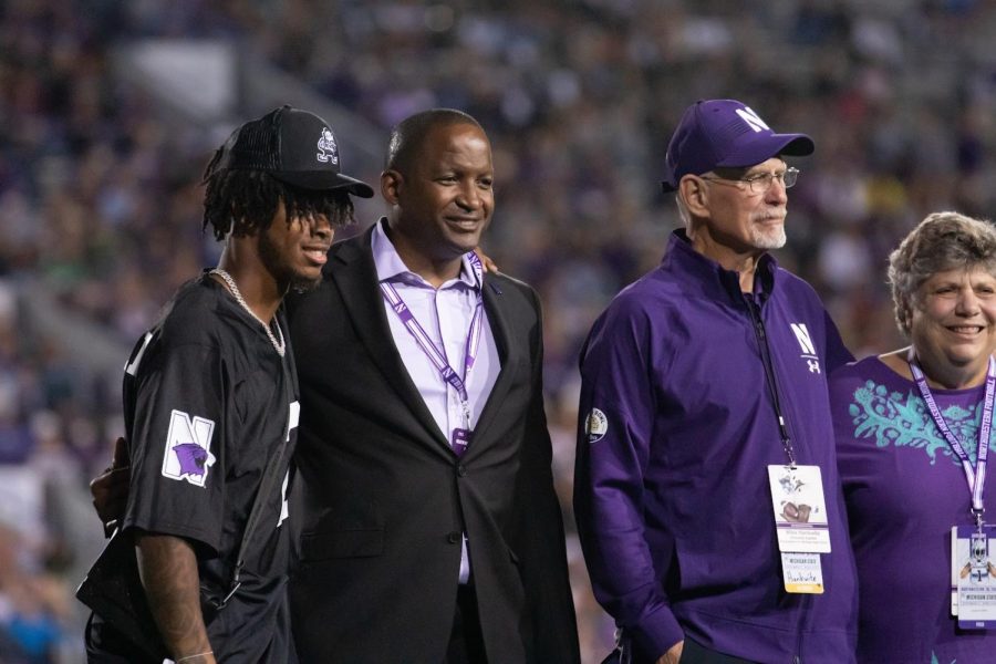 Athletic director Derrick Gragg poses with Cleveland Browns cornerback and Northwestern alumnus Greg Newsome II before the Cats’ contest against Michigan State.