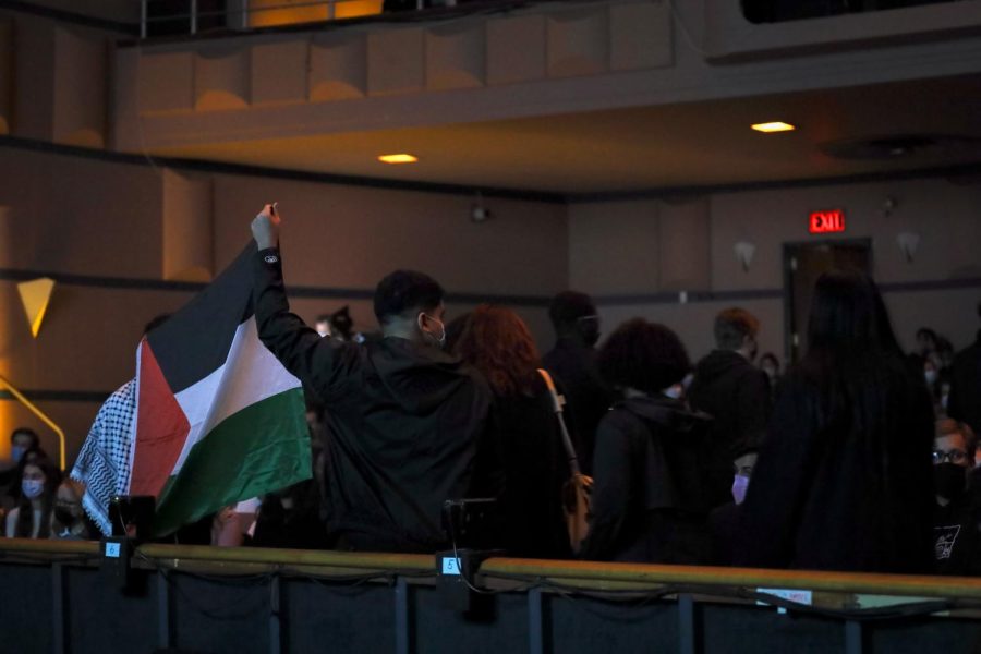 About 60 students staged a silent walkout led by Students for Justice in Palestine, a student group that promotes self-determination for the Palestinian people, after Yang gave his introductory speech.
