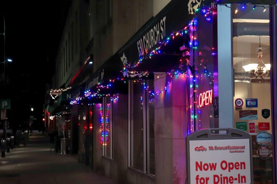 Businesses like Mt. Everest Restaurant also decorated for the holidays with colorful lights strung across the awning.
