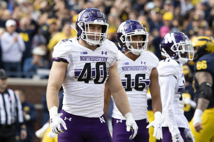 Senior linebacker Peter McIntyre and sophomore safety Brandon Joseph prepare for a play. Northwestern’s defense currently ranks 12th in the Big Ten in points and yards allowed in coordinator Jim O’Neil’s first season.