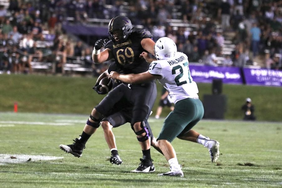 Charlie Schmidt prepares to block. The junior offensive lineman and Cubs fan said “it’s gonna be really fun to see” how Purdue and Northwestern’s game at Wrigley Field plays out.