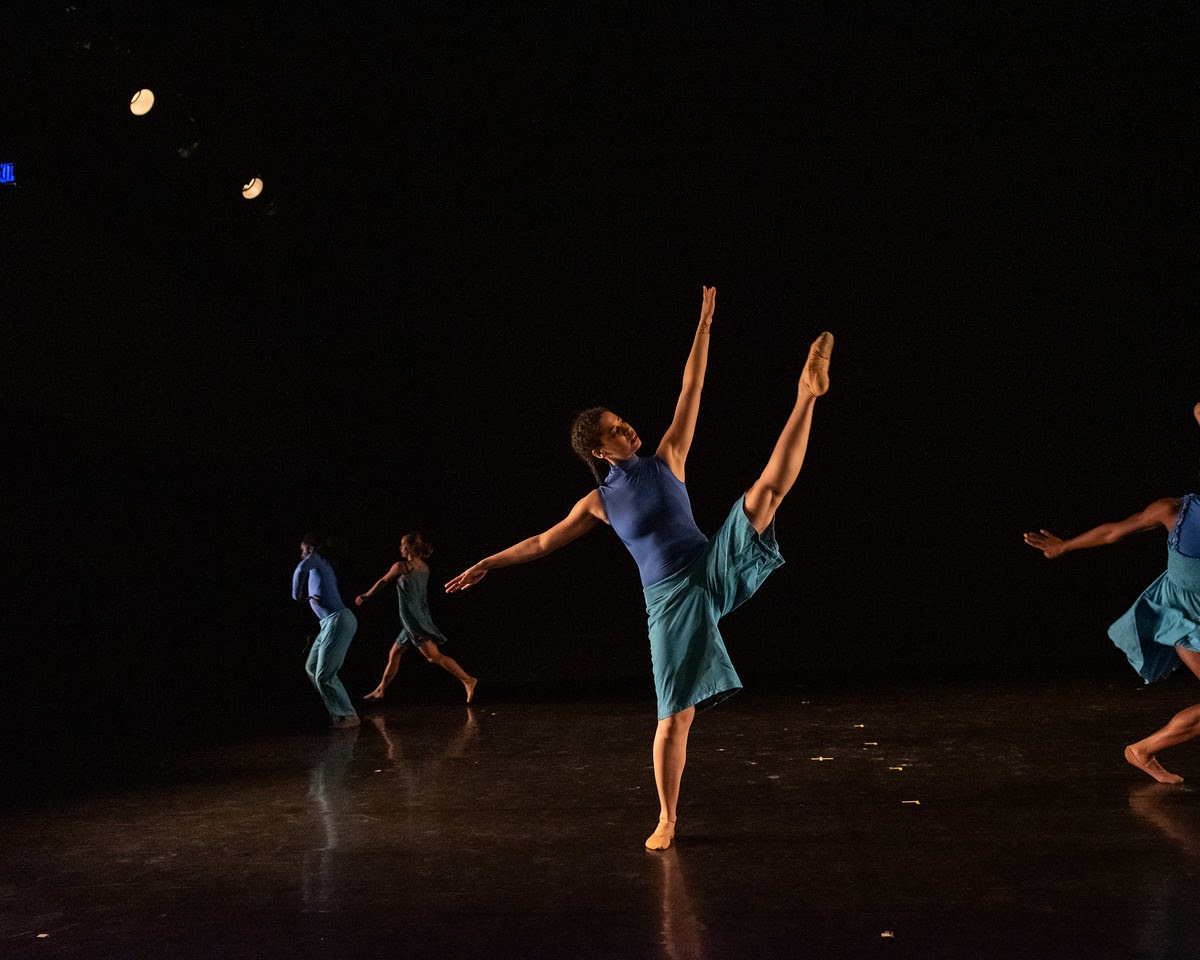 Jacinda+Ratcliffe%2C+in+blue%2C+dancing+in+one+of+her+recent+shows+with+one+leg+in+the+air.