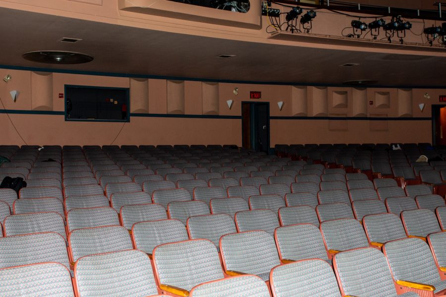 Taken from inside of the Cahn Auditorium, the photo shows rows of grey chairs.