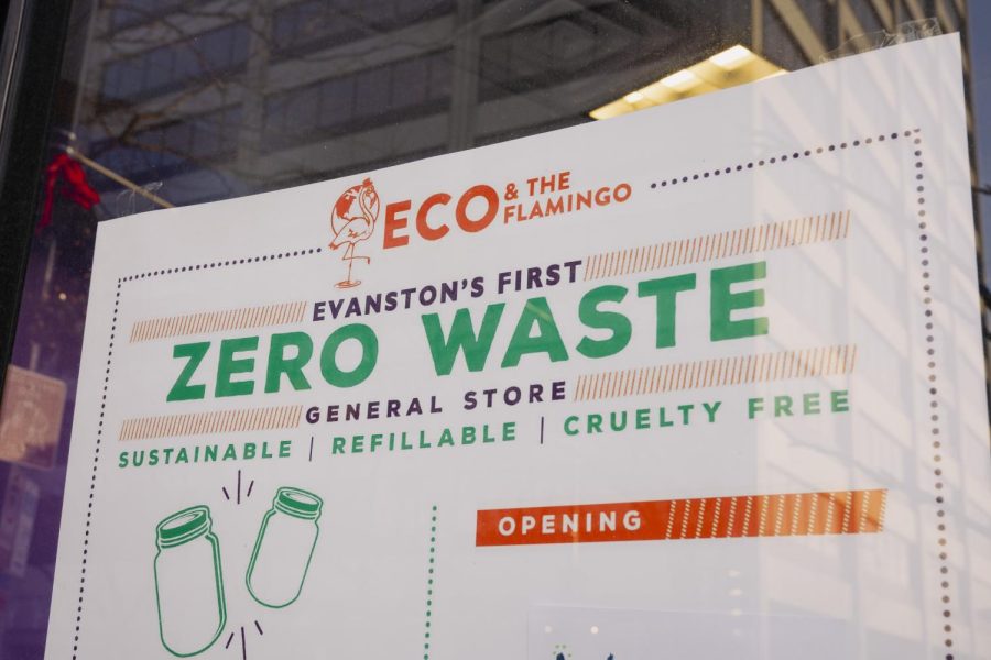 Sign on the door of Eco and the Flamingo’s Evanston storefront that reads, “Evanston’s first zero waste general store.” A graphic of mason jars sits below it on the sign.