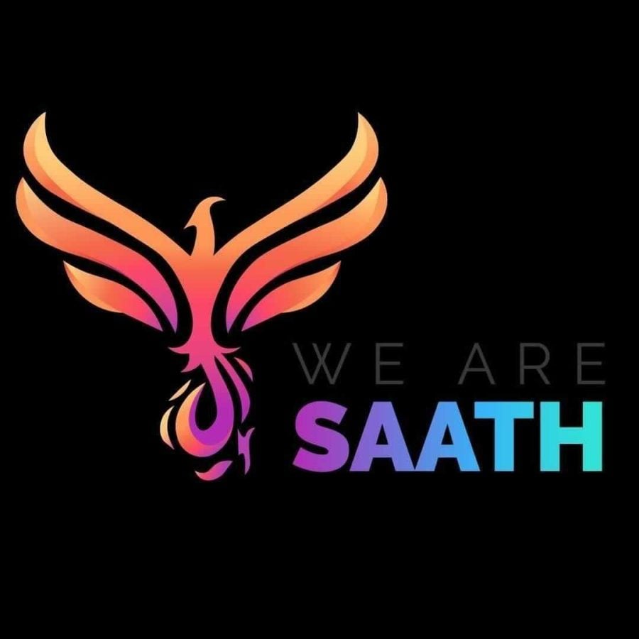 An orange and pink design next to the words “WE ARE SAATH” on a black background.