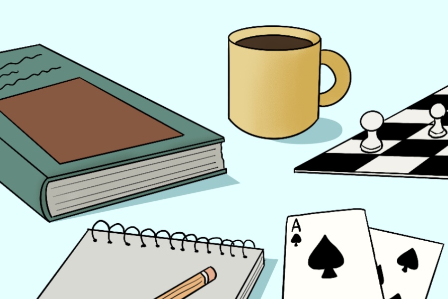 Objects, from left to right: Green book with brown square on front and black lines above brown square, grey notepad with yellow pencil, yellow mug with coffee, two black playing cards (one of which is an ace of spades), part of a chess board.