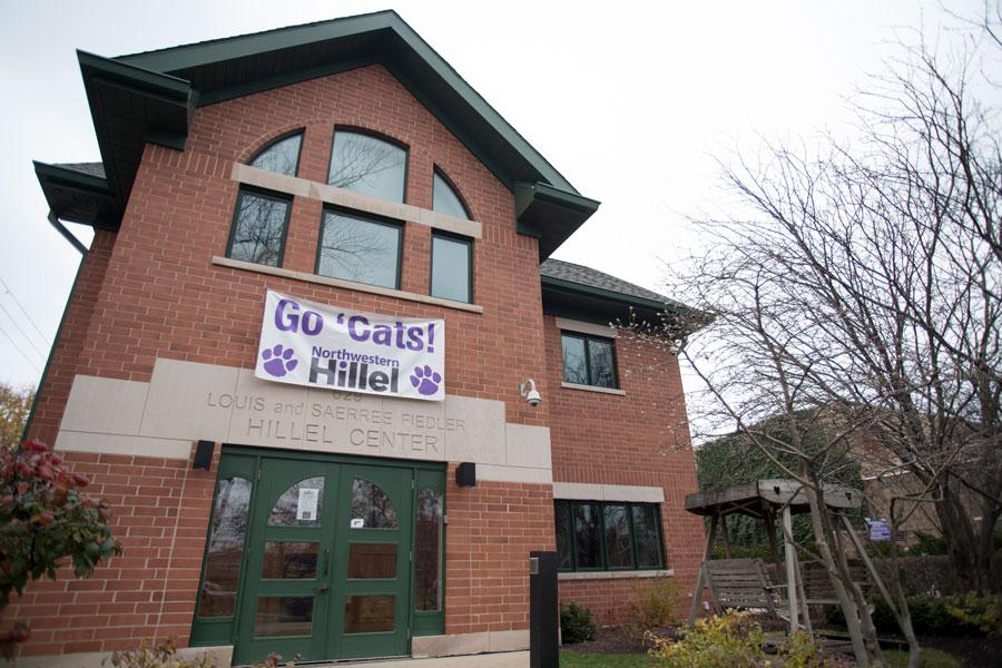 The front of the Hillel Center building. A sign reads “Go Cats!”