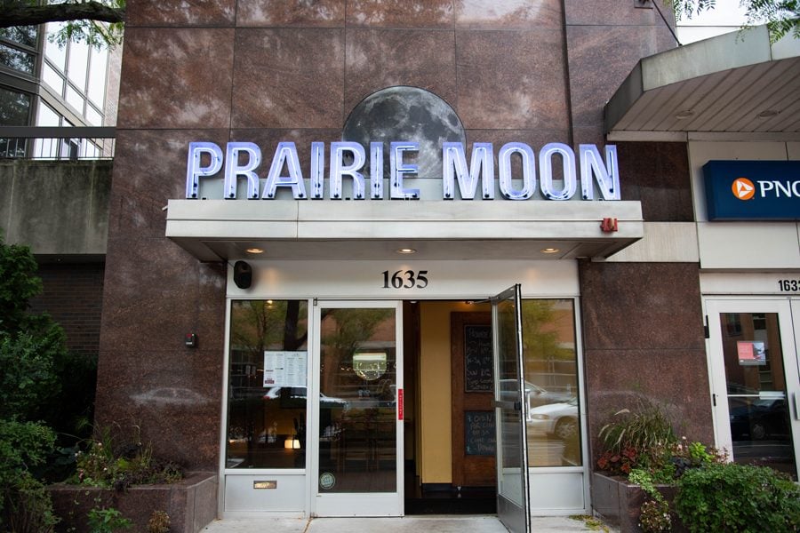 The+Prairie+Moon+storefront.+The+building+is+brown+and+the+lettering+is+blue.