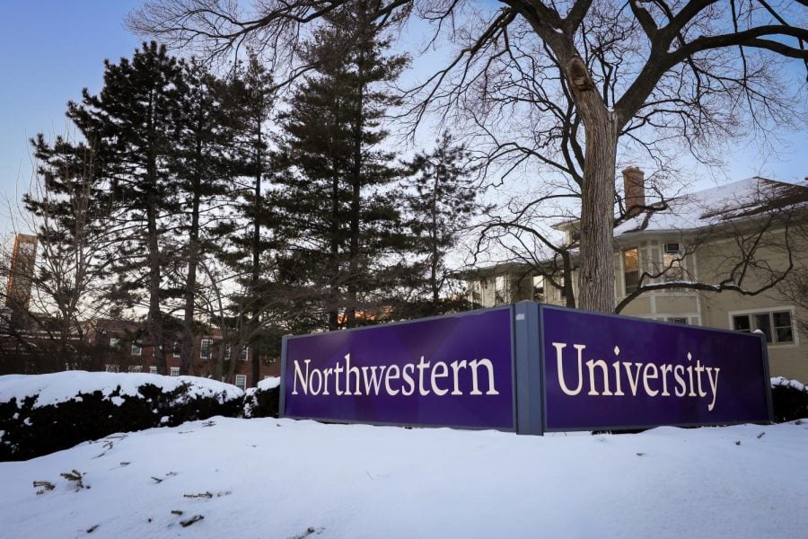 The Arch, which reads “Northwestern University.” A banner on the arch reads “Welcome Home, Wildcats!”