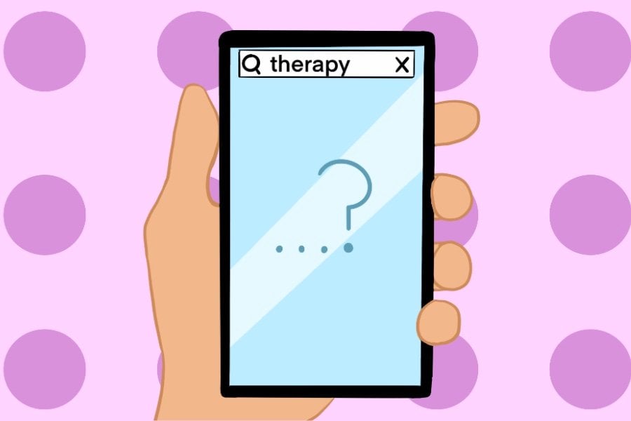 A hand holding a phone with a search bar at the top of the screen that says “therapy.” A big question mark is on the screen below the search bar. Behind the phone is a light purple background with dark purple polka dots.