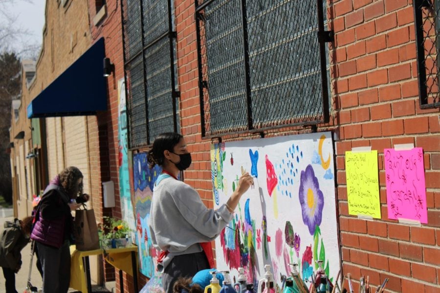 Evanston families gather to participate in art projects themed around Earth Month both in and outside the Art Makers Outpost on South Boulevard. 