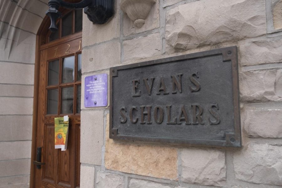 Picture of a tan building with gray sign that reads “Evans Scholars.”